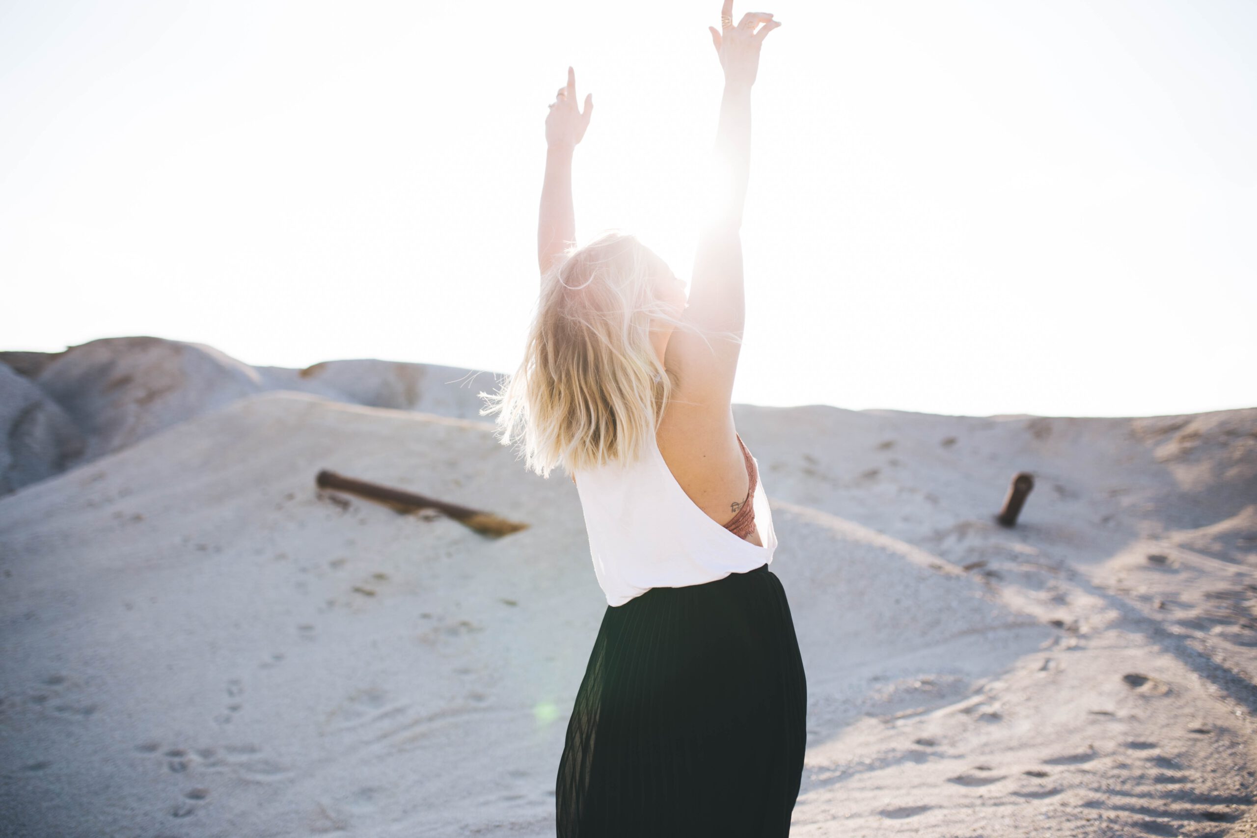 happy woman in sun rays